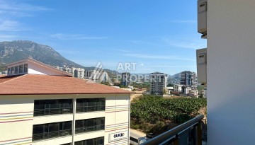 Квартира 1+1, 57 м², с видом на море, город и горы в Махмутларе - Ракурс 11