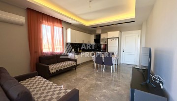 Квартира 1+1, 57 м², с видом на море, город и горы в Махмутларе - Ракурс 12