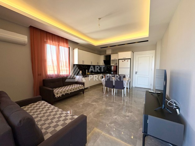 Квартира 1+1, 57 м², с видом на море, город и горы в Махмутларе - Ракурс 11