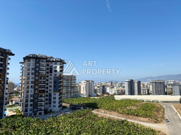 Квартира 1+1, 57 м², с видом на море, город и горы в Махмутларе - Ракурс 12