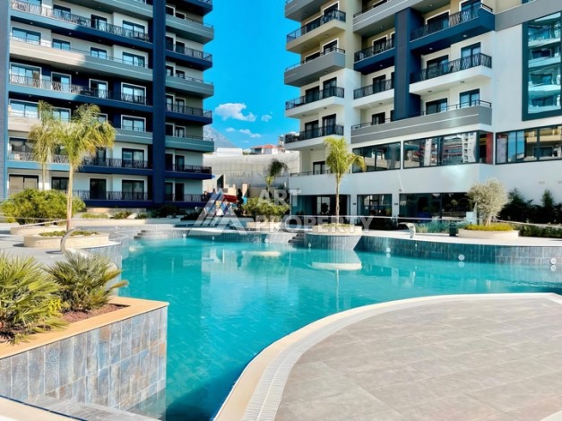 Современная квартира 1+1 в жилом комплексе с богатой инфраструктурой в районе Махмутлар, Алания - Ракурс 6