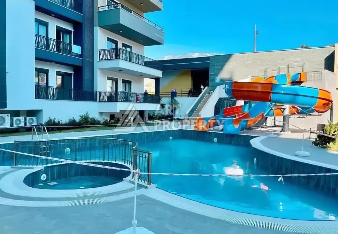 Современная квартира 1+1 в жилом комплексе с богатой инфраструктурой в районе Махмутлар, Алания - Ракурс 16