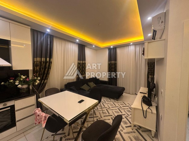 Современная квартира 1+1 в жилом комплексе с богатой инфраструктурой в районе Махмутлар, Алания - Ракурс 17