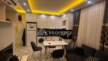 Современная квартира 1+1 в жилом комплексе с богатой инфраструктурой в районе Махмутлар, Алания - Ракурс 22