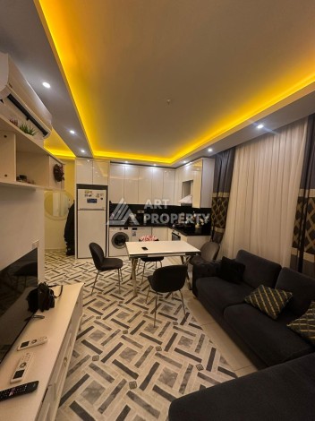 Современная квартира 1+1 в жилом комплексе с богатой инфраструктурой в районе Махмутлар, Алания - Ракурс 21