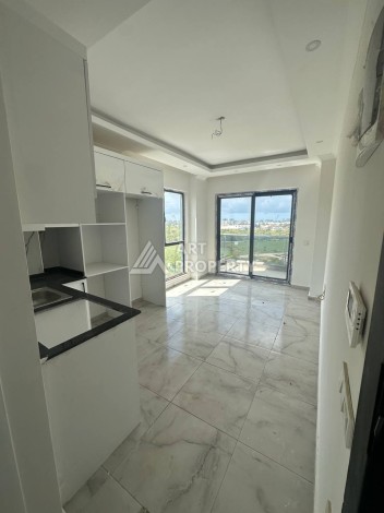 Уютная 1+1 квартира в новом комплексе в районе Демирташ - Ракурс 1