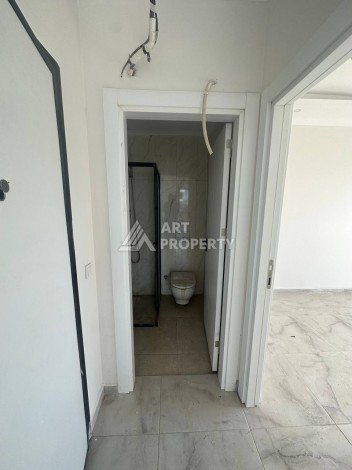 Уютная 1+1 квартира в новом комплексе в районе Демирташ - Ракурс 2