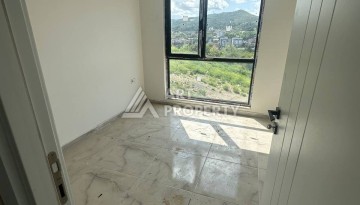 Уютная 1+1 квартира в новом комплексе в районе Демирташ - Ракурс 4