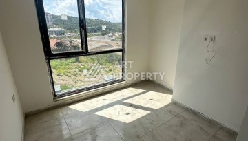 Уютная 1+1 квартира в новом комплексе в районе Демирташ - Ракурс 6