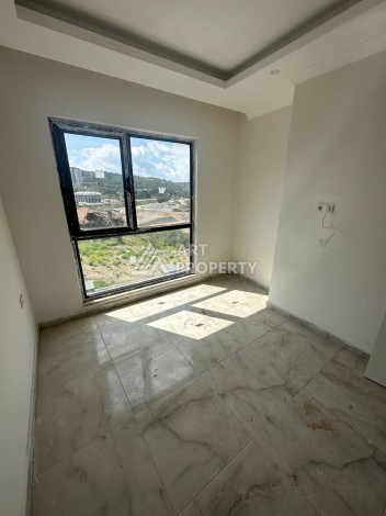 Уютная 1+1 квартира в новом комплексе в районе Демирташ - Ракурс 5