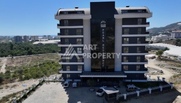 Уютная 1+1 квартира в новом комплексе в районе Демирташ - Ракурс 7