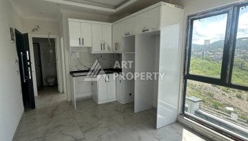 Уютная 1+1 квартира в новом комплексе в районе Демирташ - Ракурс 9