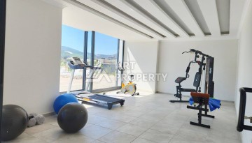 Уютная 1+1 квартира в новом комплексе в районе Демирташ - Ракурс 12