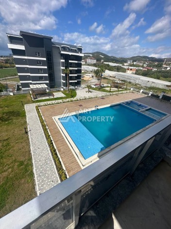 Уютная 1+1 квартира в новом комплексе в районе Демирташ - Ракурс 12