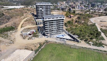 Уютная 1+1 квартира в новом комплексе в районе Демирташ - Ракурс 15