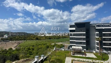 Уютная 1+1 квартира в новом комплексе в районе Демирташ - Ракурс 21