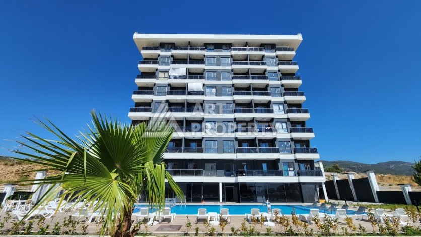 Уютная 1+1 квартира в новом комплексе в районе Демирташ - Ракурс 22