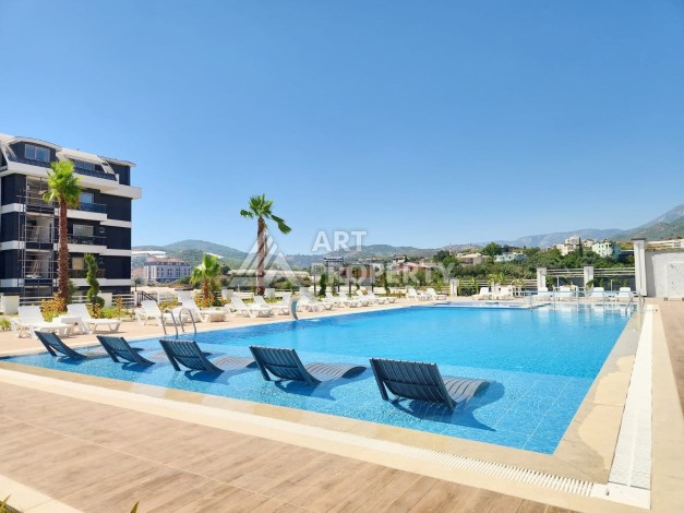 Уютная 1+1 квартира в новом комплексе в районе Демирташ - Ракурс 24