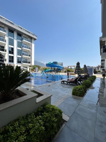 Квартира 1+1 с застекленным балконом в Оба, 55 кв.м. - Ракурс 0