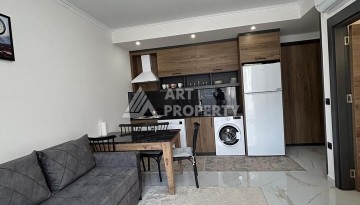 Квартира 1+1 с застекленным балконом в Оба, 55 кв.м. - Ракурс 3