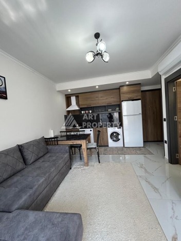 Квартира 1+1 с застекленным балконом в Оба, 55 кв.м. - Ракурс 2