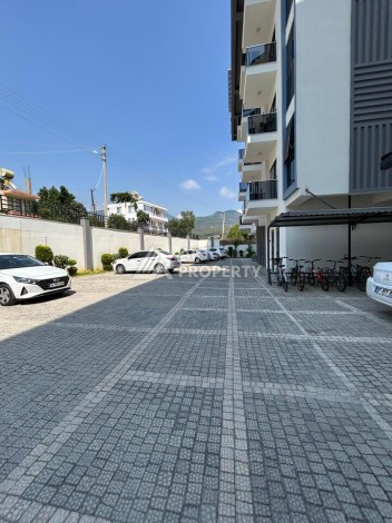 Квартира 1+1 с застекленным балконом в Оба, 55 кв.м. - Ракурс 19