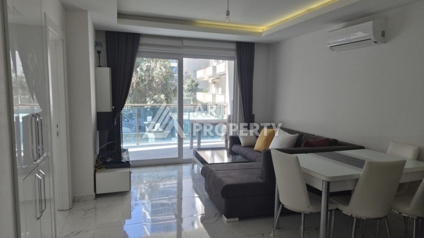 Уютная квартира 1+1 в комплексе в районе Махмутлар - Ракурс 1