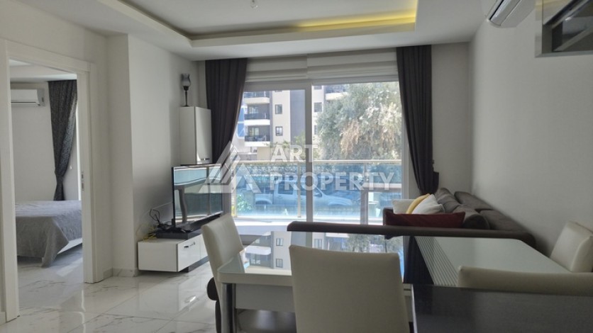 Уютная квартира 1+1 в комплексе в районе Махмутлар - Ракурс 2