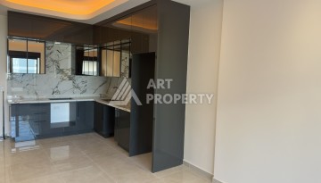 Современная квартира 1+1 в премиальном комплексе в районе Махмутлар - Ракурс 4