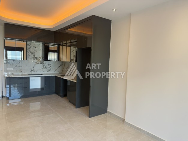 Современная квартира 1+1 в премиальном комплексе в районе Махмутлар - Ракурс 3