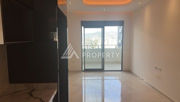 Современная квартира 1+1 в премиальном комплексе в районе Махмутлар - Ракурс 5