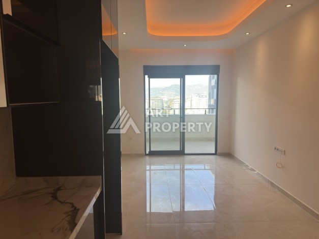 Современная квартира 1+1 в премиальном комплексе в районе Махмутлар - Ракурс 4