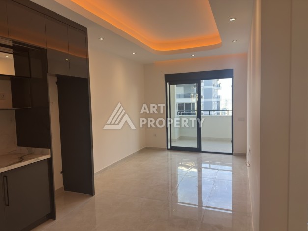 Современная квартира 1+1 в премиальном комплексе в районе Махмутлар - Ракурс 5