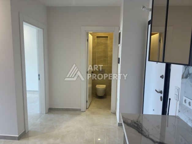 Современная квартира 1+1 в премиальном комплексе в районе Махмутлар - Ракурс 6