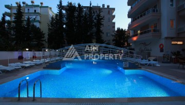 Большая квартира 1+1 в центре Алании, 65 м² с видом на крепость - Ракурс 21