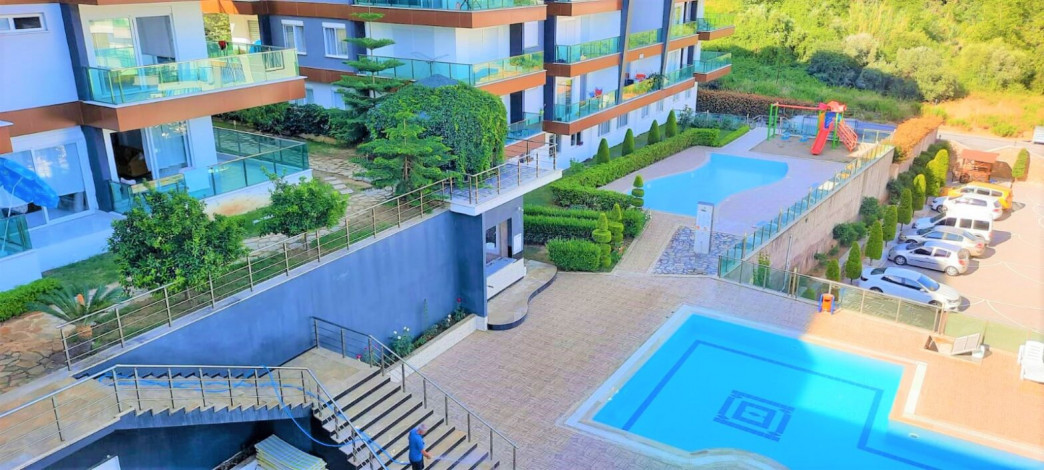 Квартира 1+1 с собственным садом в районе Кестель, 60 м2 - Ракурс 12