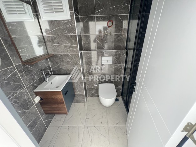 Уютная вартира 1+1 с видом на море в районе Каргыджак. - Ракурс 24