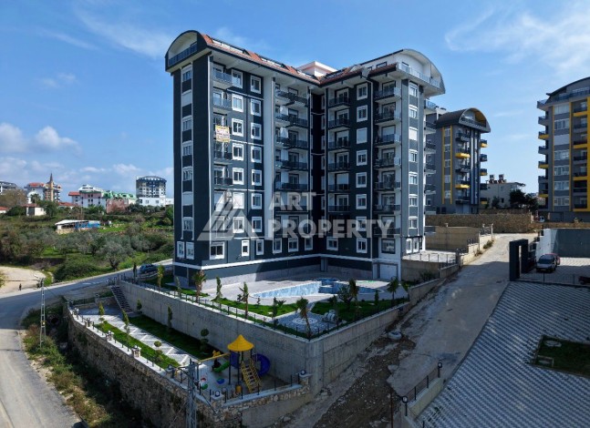 Новая квартира 1+1 в современном комплексе в районе Авсаллар - Ракурс 0