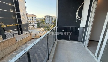 Новая квартира 1+1 в современном комплексе в районе Авсаллар - Ракурс 19