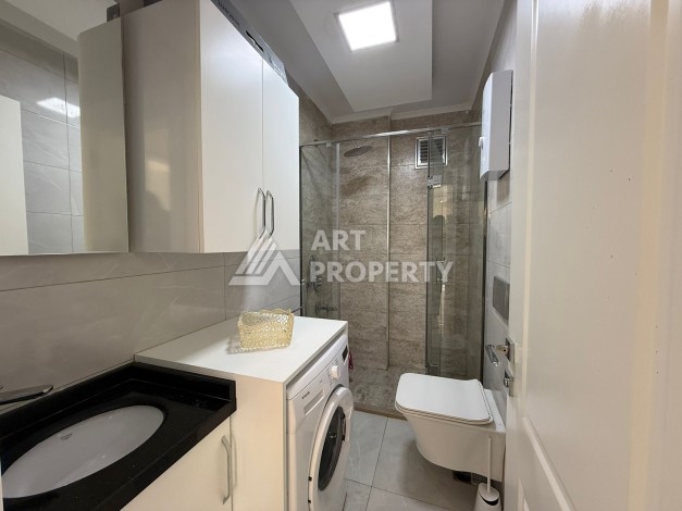 Инвестиционно привлекательная квартира 1+1  в районе Махмутлар - Ракурс 11