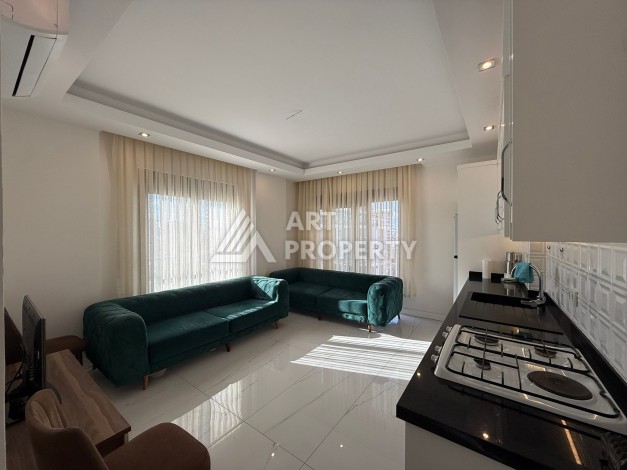 Инвестиционно привлекательная квартира 1+1  в районе Махмутлар - Ракурс 12