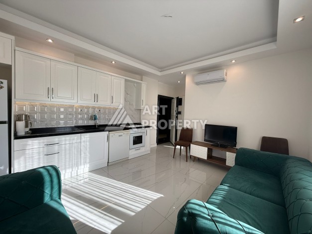 Инвестиционно привлекательная квартира 1+1  в районе Махмутлар - Ракурс 13