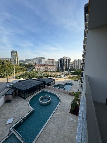 Отличный вариант 1+1 в новом комплексе в районе Махмутлар - Ракурс 0