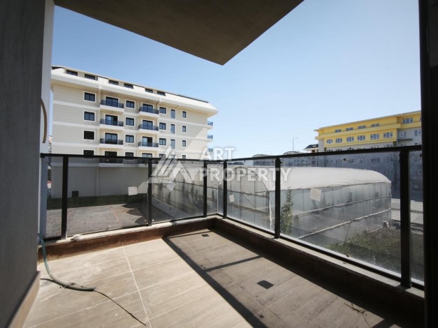 Квартиар 1+1 в районе Каргыджак - 55 м² - Ракурс 9