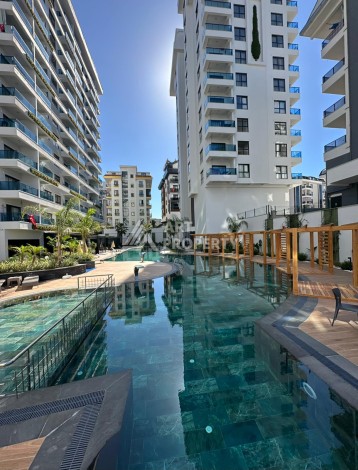 Квартира 1+1 в престижном ЖК, 57 м². Махмутлар, Алания - Ракурс 1