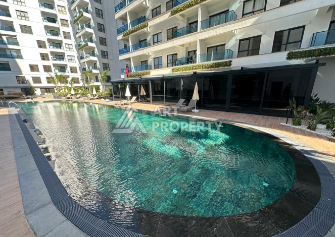 Квартира 1+1 в престижном ЖК, 57 м². Махмутлар, Алания - Ракурс 3