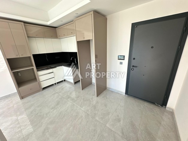 Квартира 1+1 в престижном ЖК, 57 м². Махмутлар, Алания - Ракурс 9