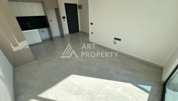 Квартира 1+1 в престижном ЖК, 57 м². Махмутлар, Алания - Ракурс 11