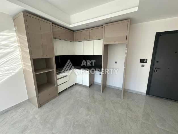 Квартира 1+1 в престижном ЖК, 57 м². Махмутлар, Алания - Ракурс 11