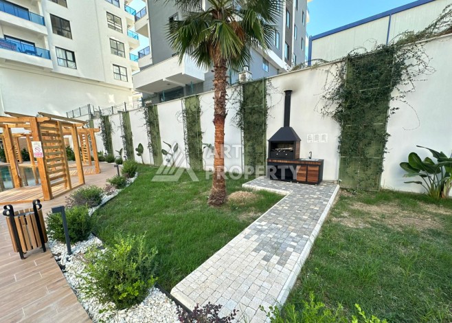 Квартира 1+1 в престижном ЖК, 57 м². Махмутлар, Алания - Ракурс 39